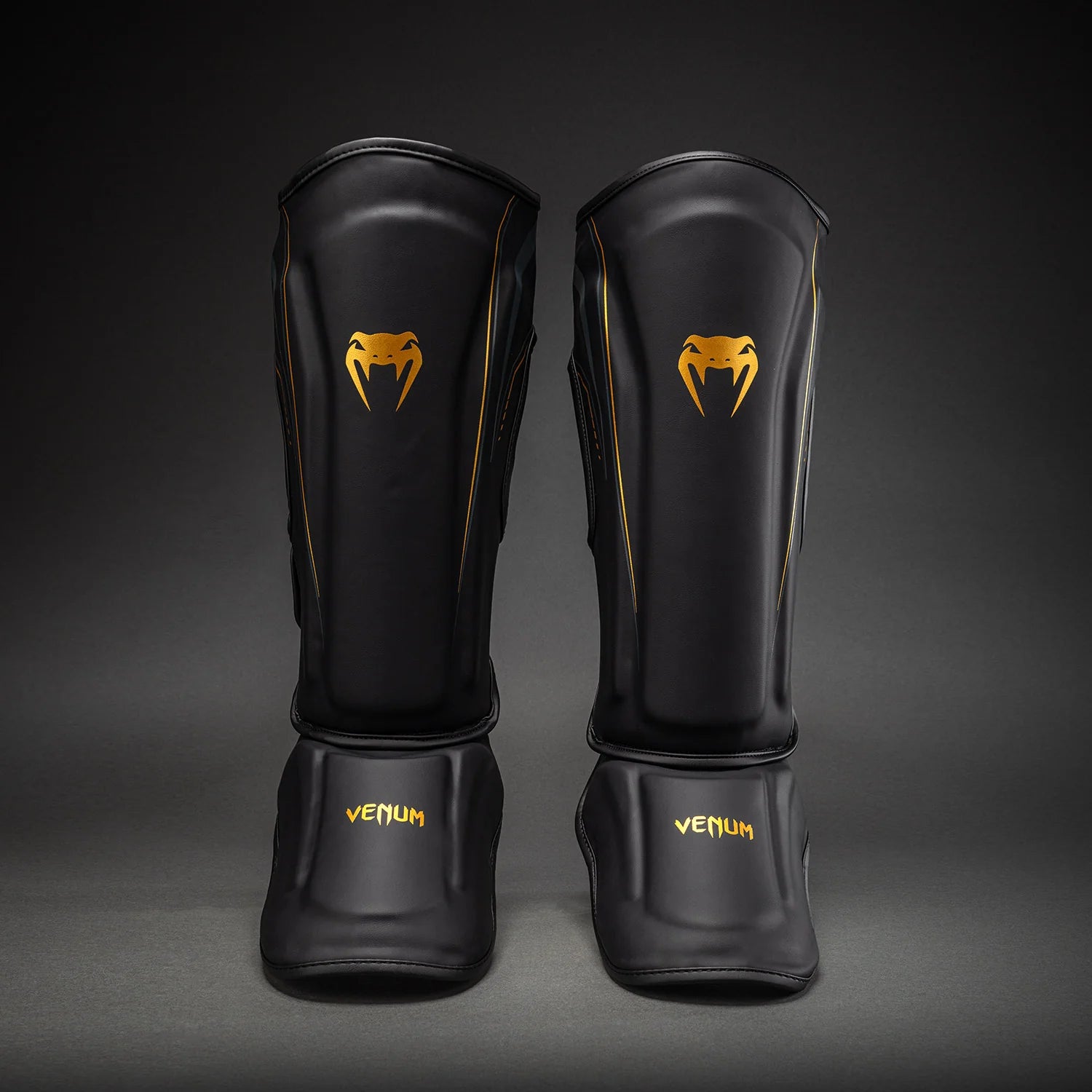 Espinilleras Venum Streamline - Negro/Oro