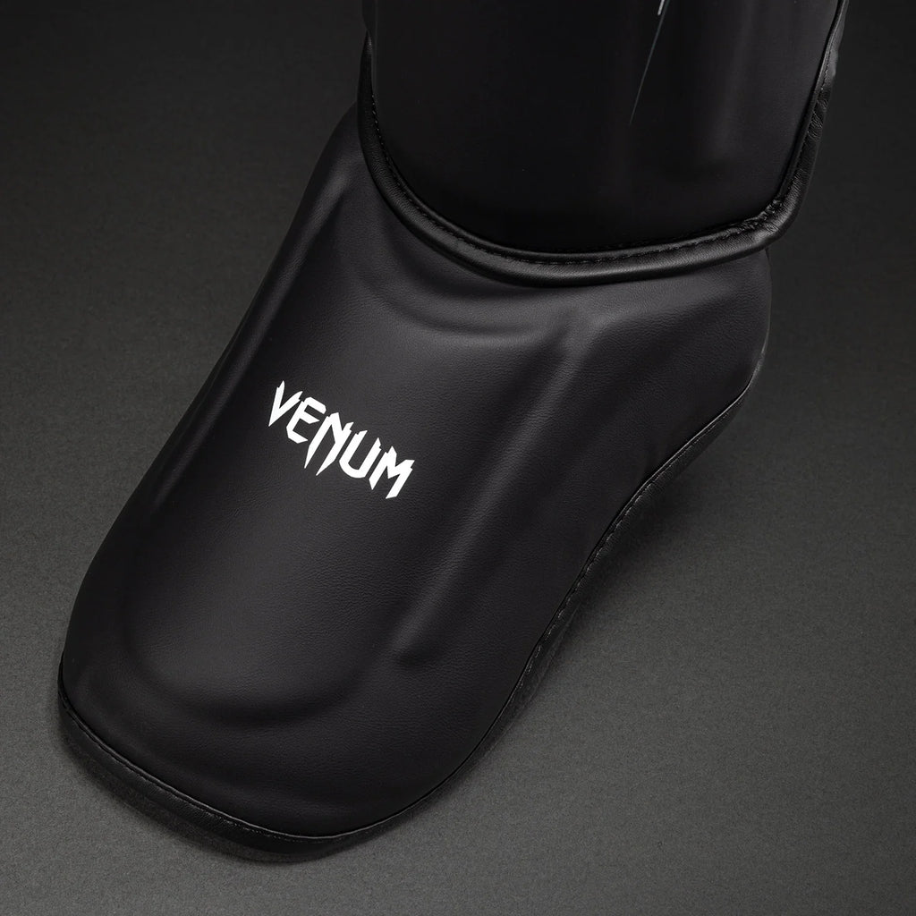 Espinilleras Venum Streamline - Negro/Oro
