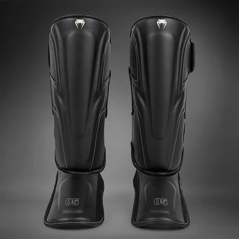 Espinilleras Venum Impact Evo  - Negro
