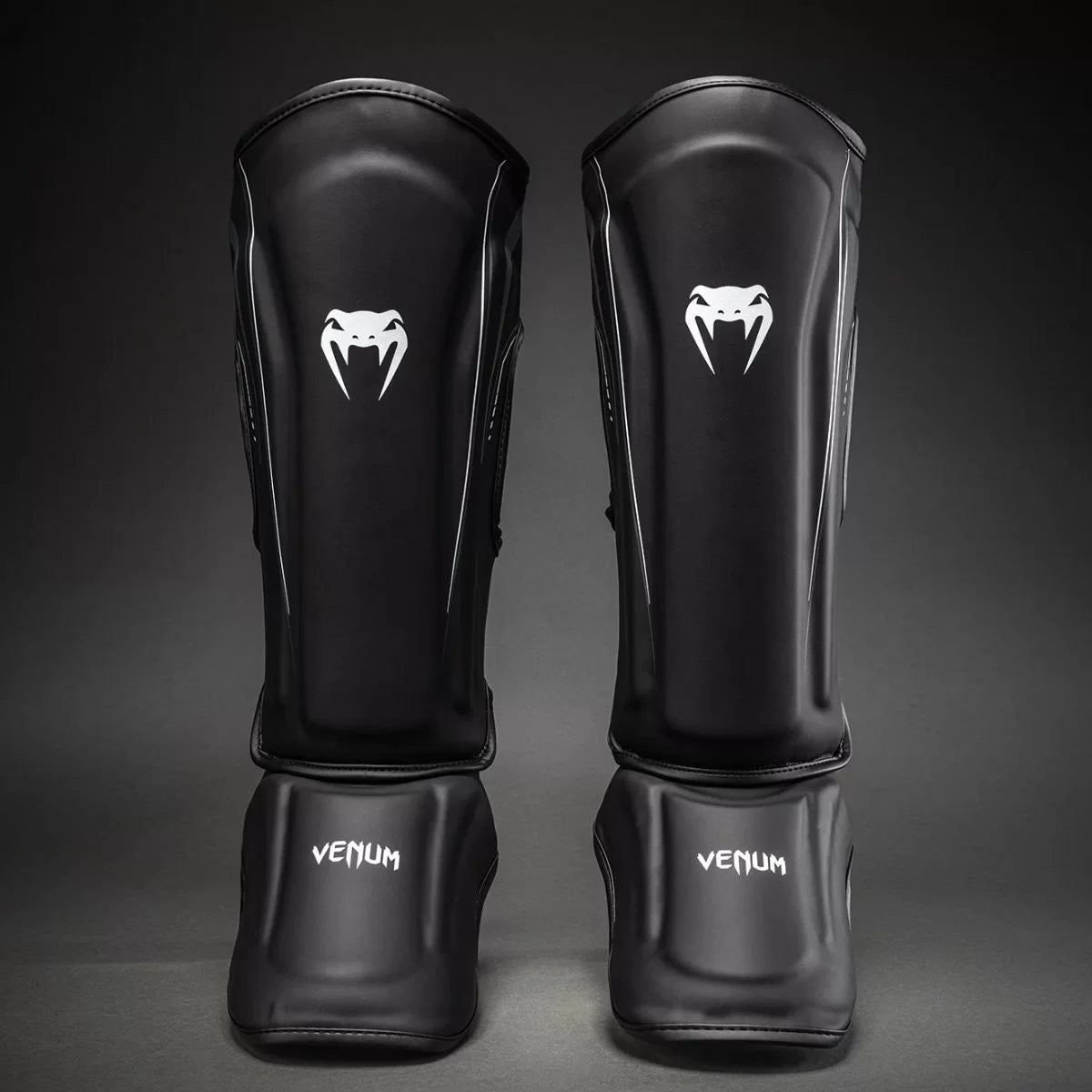 Espinilleras Venum Streamline – Negro/Blanco