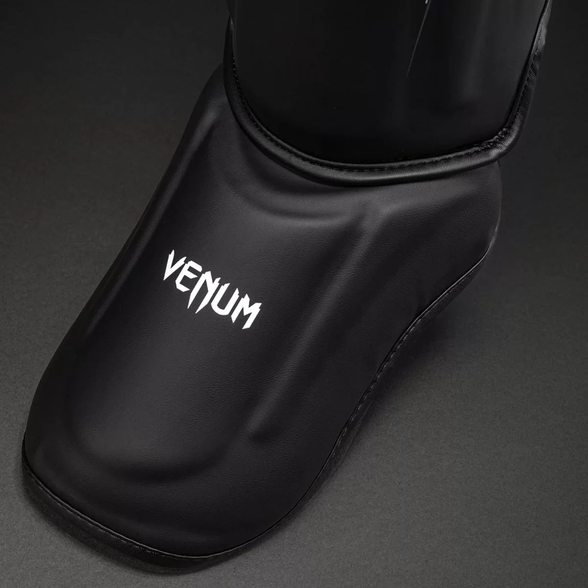 Espinilleras Venum Streamline – Negro/Blanco